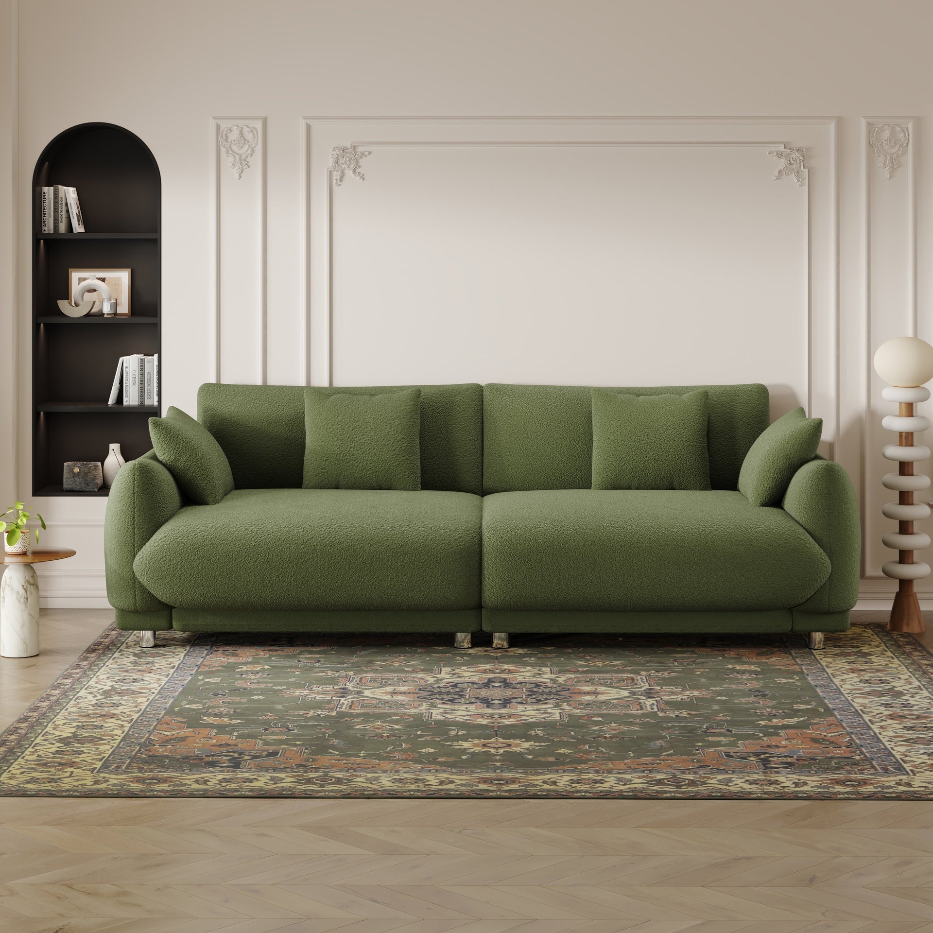 An 86.6-inch teddy wool green sofa with four throw pillows and hardware feet that can sit comfortably in an apartment bedroom wi